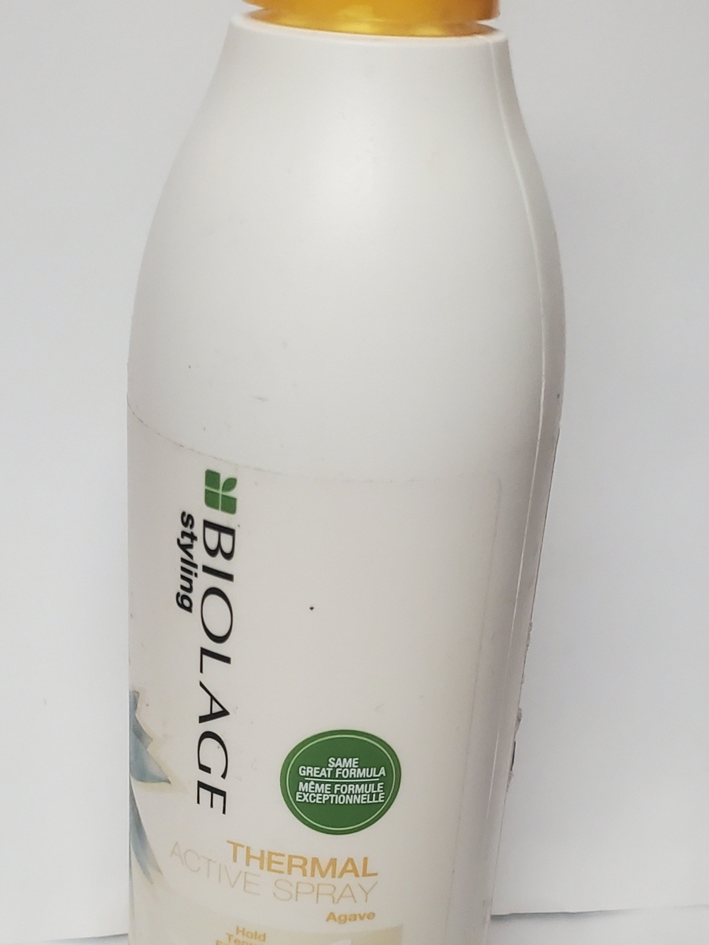 Matix White Bottle with Gold Cap Heat Protectant